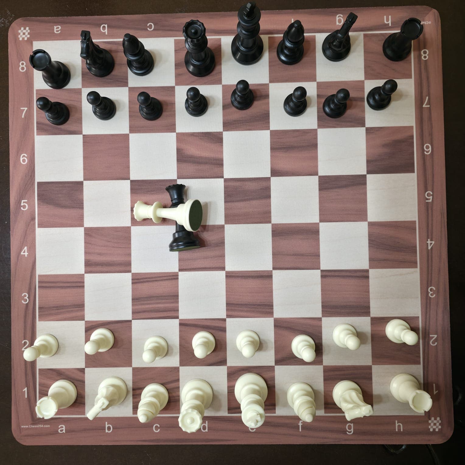 Walnut-print rubber chess board with pieces